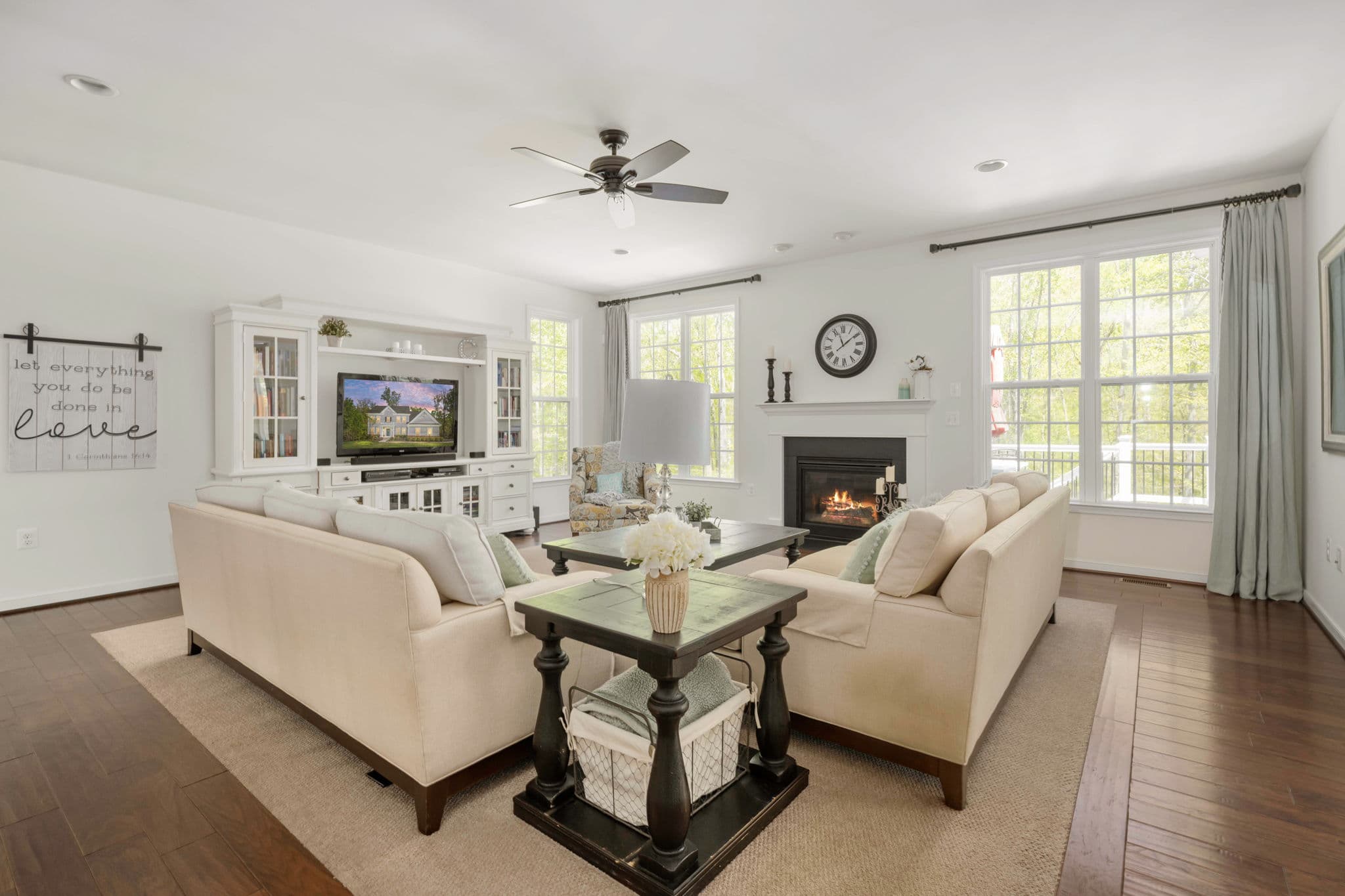 A bright, warmly styled living room with soft natural light